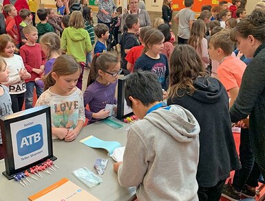 The grand opening of the Vulcan Prairieview Elementary School Junior ATB Branch saw bank staff deal with plenty of customers.