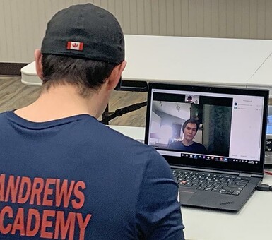 Coaldale Fire Chief Kevin McKeown goes through medical scenarios online with a Kate Andrews High School Fire Academy student.