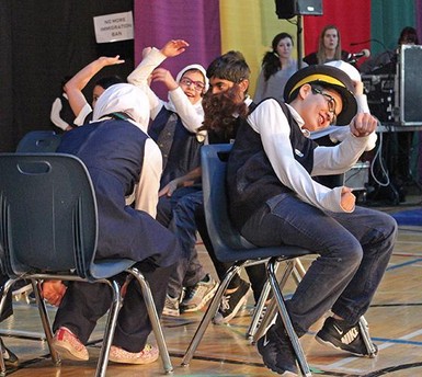Students act out a scene in Trickster's production with Calgary Islamic School, OBK Campus.