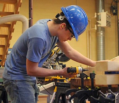 Ajay Coutts of Kate Andrews High School competes in the carpentry event at the regional Skills competition.