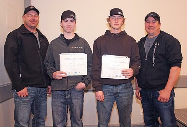 From left to right, Larry Gejdos (K-Line); Kace Skipworth, Kate Andrews High School; Trey Kallens, Kate Andrews High School; and Wade Feist (A1 Fabrication).