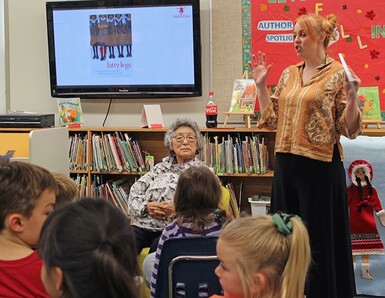 Christy Jordan-Fenton, right, and her mother-in-law, Margaret Pokiak-Fenton, speaks with Milo Community School students about Residential Schools.