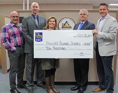 From left to right,Palliser Associate Superintendent, Pat Rivard, VP Alberta South RBC,Terry Belisle, Senior Commercial Manager RBC, Jackie Lovell, Palliser Superintendent, Dave Driscoll, and Palliser Director of Learning, Jason Kupery.