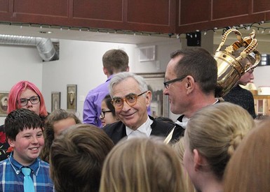 Speaker Robert Wanner,left, and Sergeant-at-Arms Brian Hodgson with the Alberta Mace, chat with R.I. Baker Middle School students.