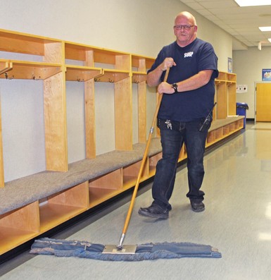Ken Wahl makes a clean sweep at Jennie Emery Elementary School.