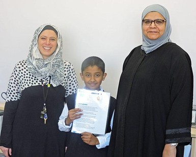 Abdur Rahman with his submission to the Meaning of Home contest.